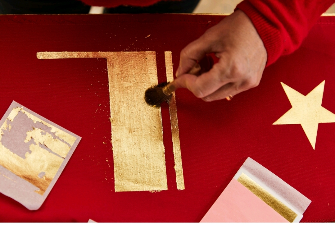 Application de feuille d'or
